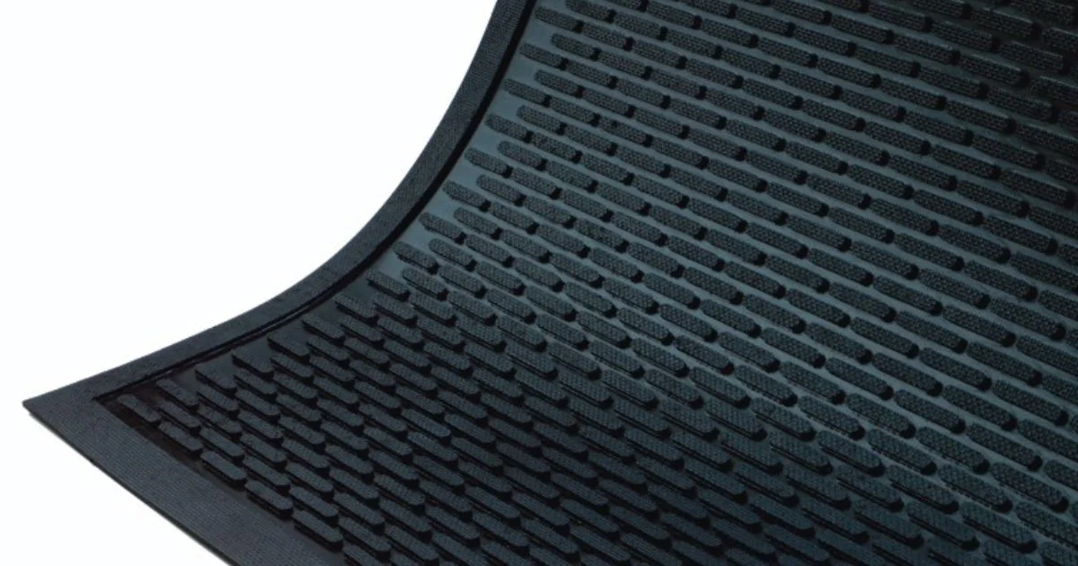 Textured scraper mat on white background